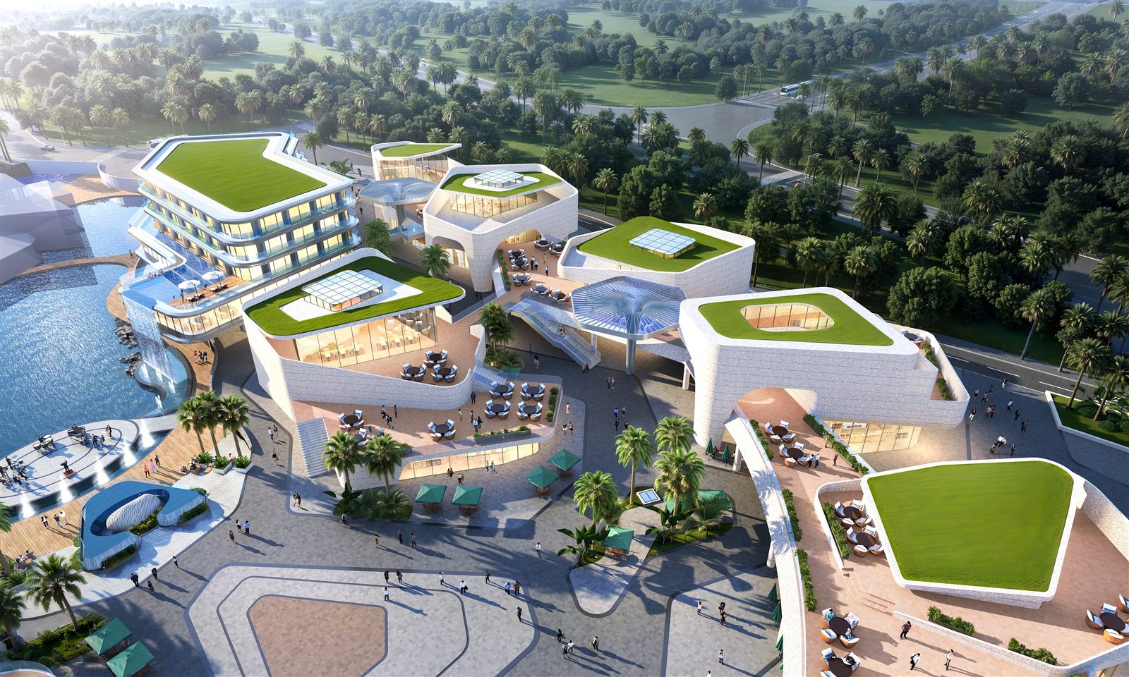 Daytime aerial of the mall's green-roofed retail buildings, pedestrian plazas, outdoor dining and water features