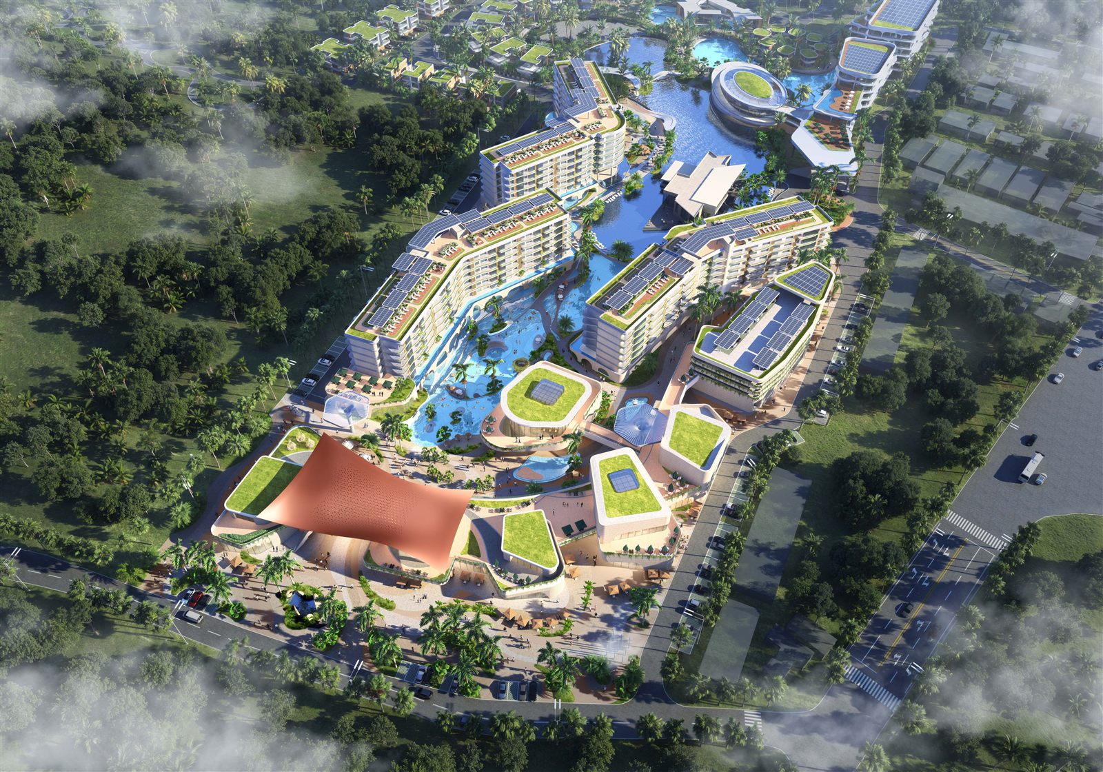 Daytime aerial of the Royal Lee Phuket development with the mall in front of the residences, lagoon pools and solar roofs