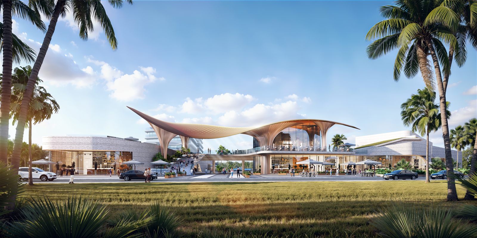 The mall's signature sweeping bamboo-style curved canopy roof over the open-air, two-storey retail and dining building, framed by palm trees